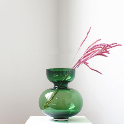 مزهرية زجاجية من القرع الأخضر