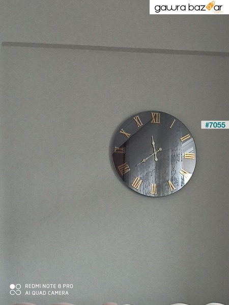 ساعة حائط مزخرفة بأرقام زجاجية بمرآة حقيقية 46 سم