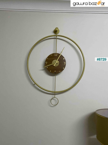 ساعة حائط معدنية اوربت جولد 60 سم ديكور عصري